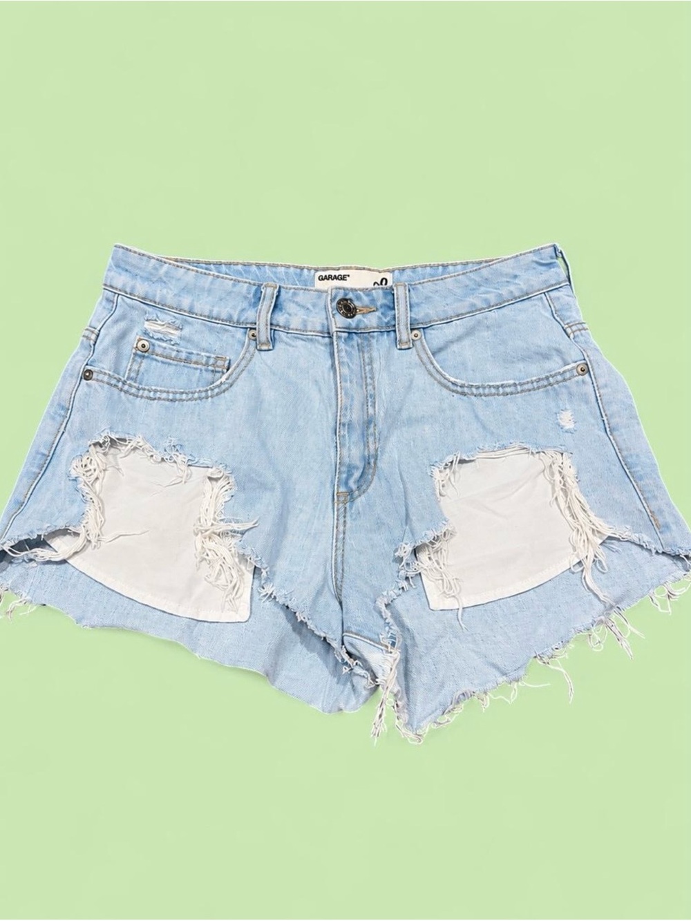 Garage 09 Ultra Distressed Light Wash Denim Shorts